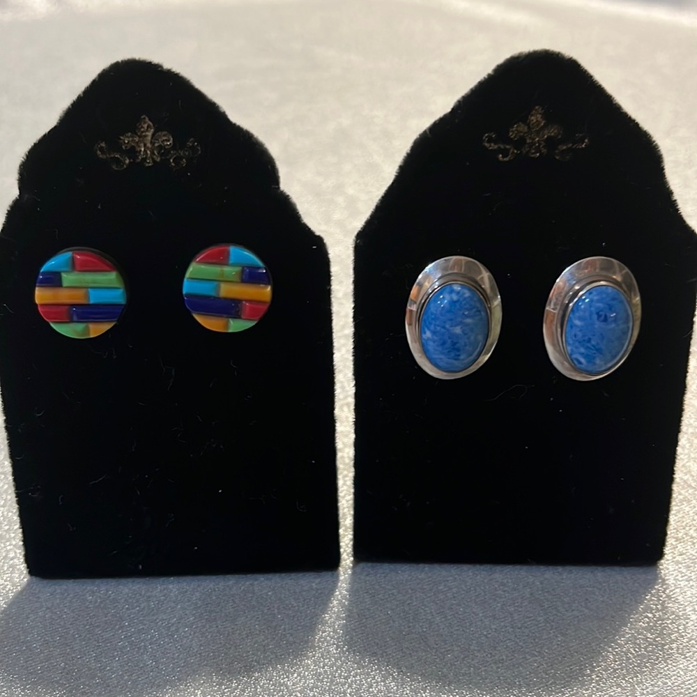 Two pair of sterling silver post earrings with turquoise and other stones